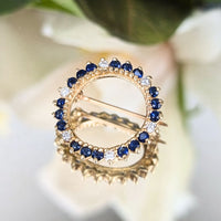 Vintage 14K Gold, Blue Sapphire, & Diamond Wreath Brooch