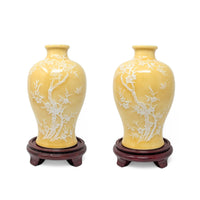 Pair of Pâte-sur-Pâte Porcelain Vases with Decorative Wood Stands