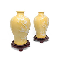 Pair of Pâte-sur-Pâte Porcelain Vases with Decorative Wood Stands