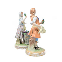Carl Thieme Dresden "Man & Woman Selling Flowers" Porcelain Figurines (Pair)