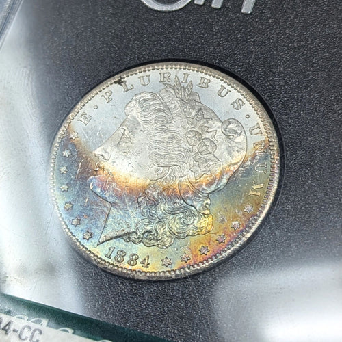 1884-CC CAC MS63 Crescent Rainbow Toned GSA Morgan Dollar