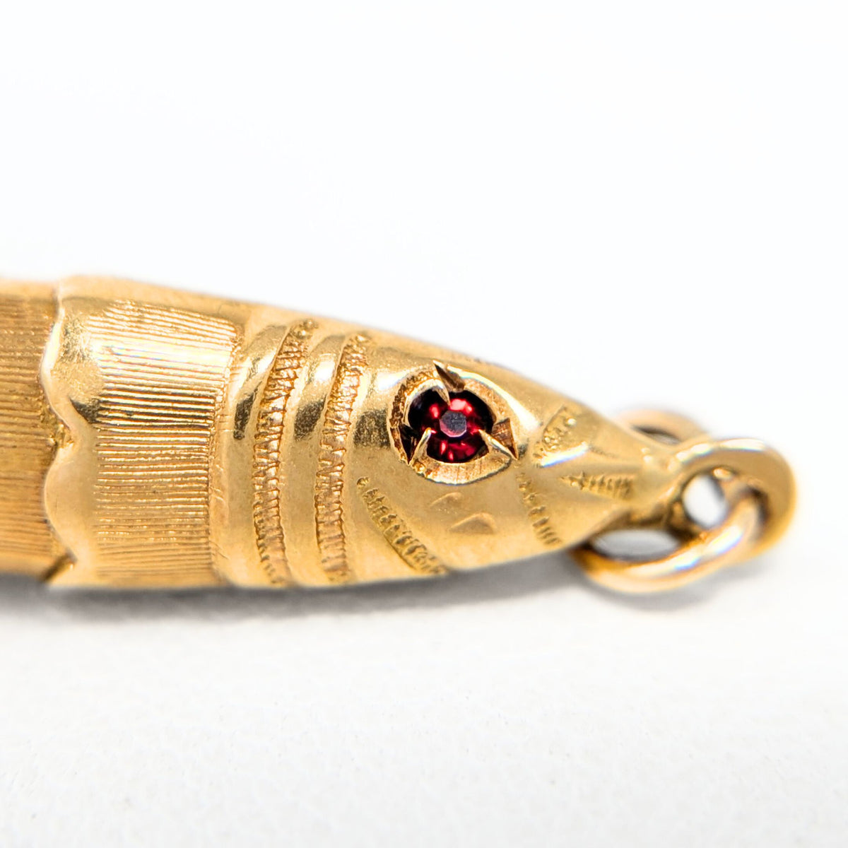 18K Gold Articulated Fish Charm W/ Ruby Eyes