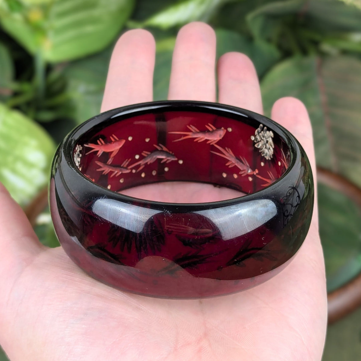Vintage Cherry Juice Red Bakelite Reverse Carved Bangle, Fish/Aquarium Motif